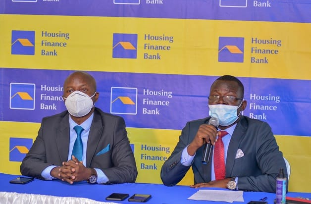 Patrick Oyuru, Head Marketing and Communications joins John Baptist Kaweesi, the Head of Mortgage and Consumer Banking to launch the Double-Double Unsecured Salary Loan Campaign