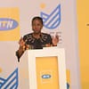 Anne-Juuko-Chief-Executive-Officer-Stanbic-Bank-the-transaction-advisor-of-the-MTN-IPO-makes-her-remarks-during-the-listing-of-MTN-on-the-Uganda-Securities-Exchange