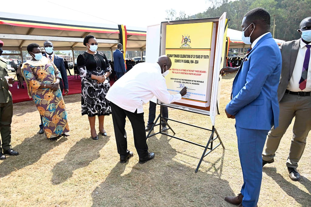 President Yoweri Museveni signing the roadmap towards celebrating of the 30 years of youth council in Uganda 1994-2024 during the International Youth Day celebrations in Kabale  on 18th August 2023. 